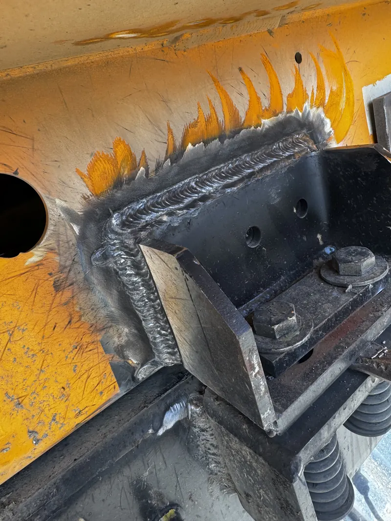 Clean weld bead on a heavy equipment attachment plate, on-site repair in Reno NV